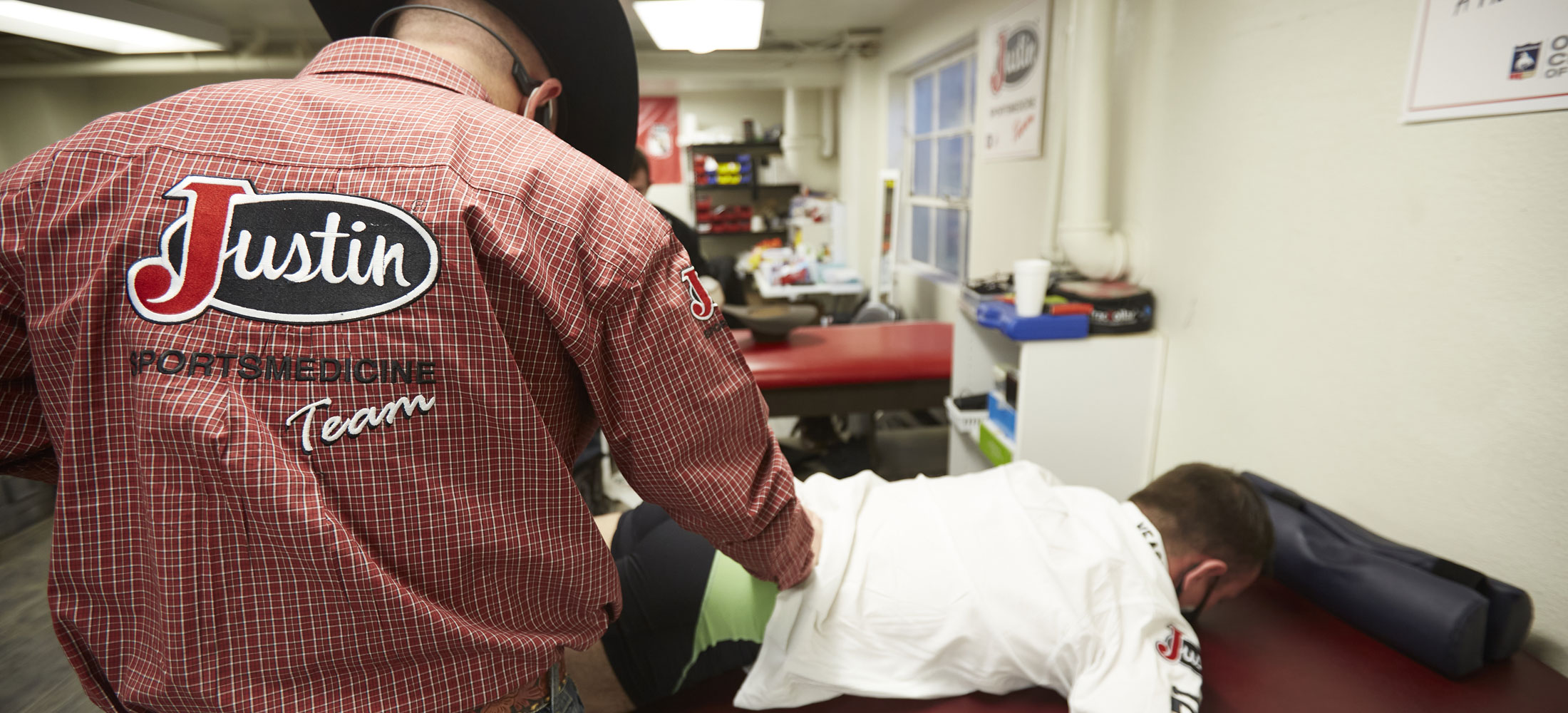 A member of the Justin Sportsmedicine Team® working on a patient. 